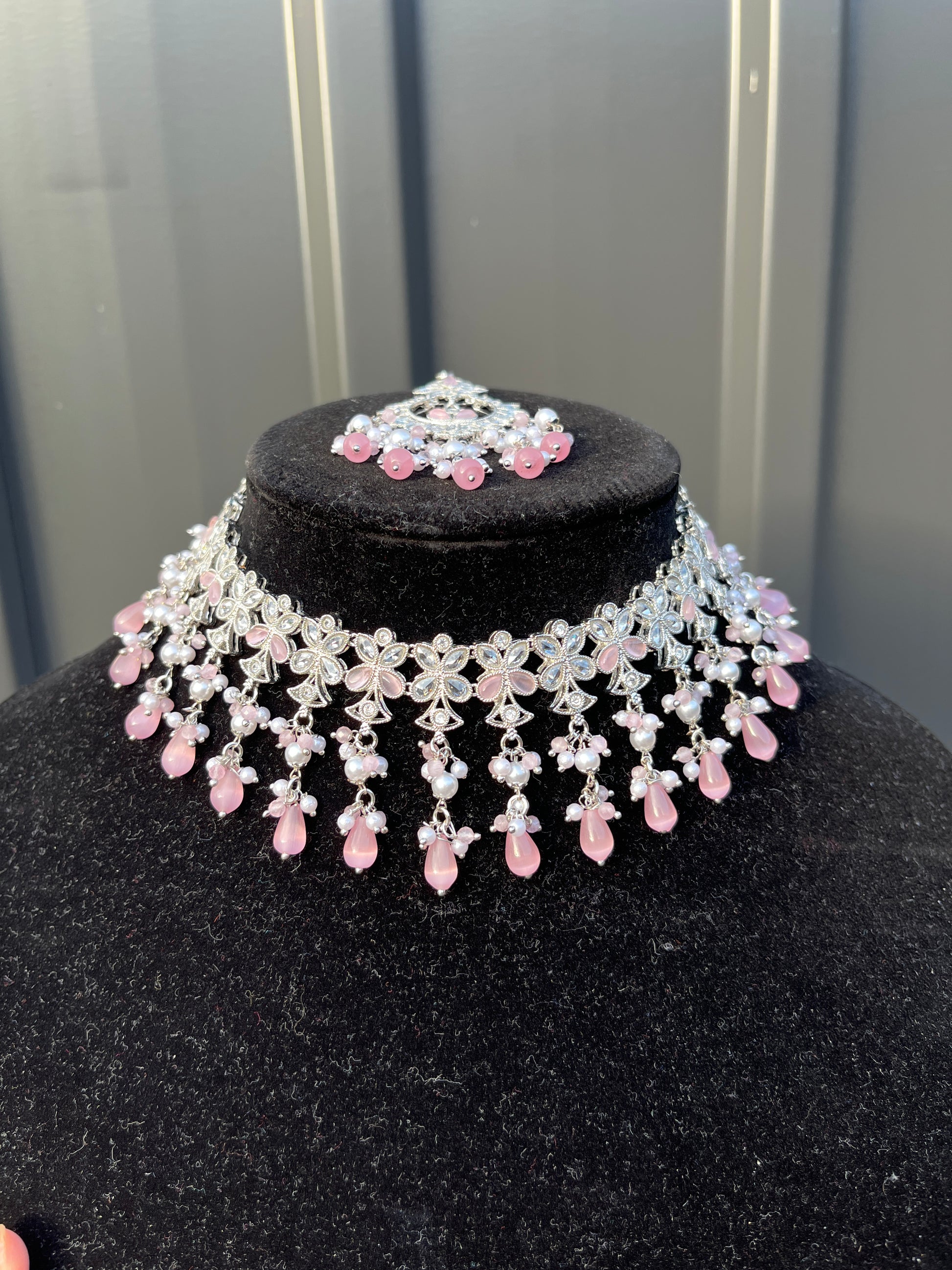 Necklace and Tikka - Silver Choker, Earring and Tikka set with White and Pink Coloured Stones. High-quality and perfect for indian weddings, bridal showers, functions, events, festivals and to give as gifts.